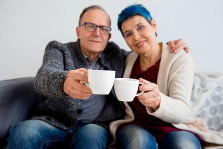 Senior couple cuddlingの写真素材