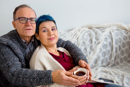 Senior couple cuddlingの写真素材