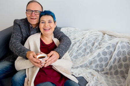 Senior couple cuddlingの写真素材