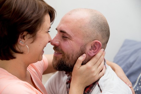 Couple spending time in bedの写真素材