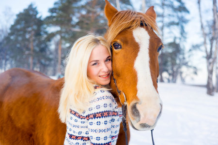 Girl with a horseの写真素材