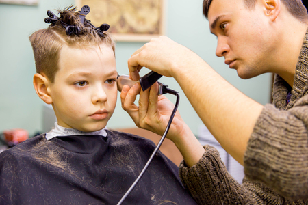 kid in barbershopの写真素材