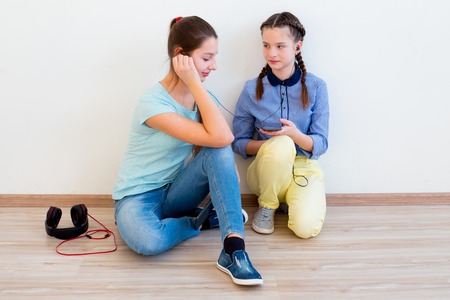 kids using different gadgetsの写真素材