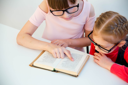 kids reading booksの写真素材
