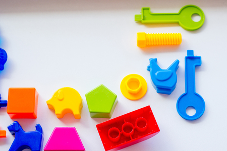 Set of toys for babies on a white tableの写真素材