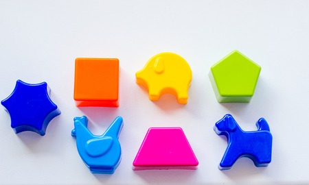 Set of toys for babies on a white tableの写真素材