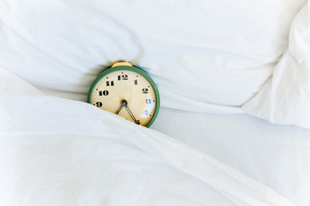 Retro alarm clock on a wite table