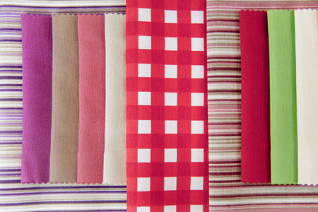 Rolls of colorful fabric and textiles in a shop or store