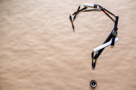 stationery pen scissors notebook on a wooden tableの写真素材