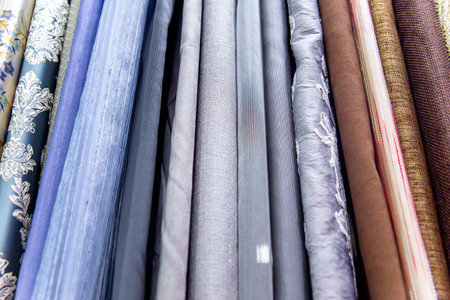 Rolls of fabric and textiles in a shop or store