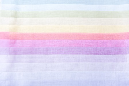 Rolls of fabric and textiles in a shop or storeの写真素材