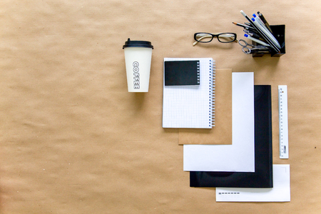 stationery pen scissors notebook on a wooden tableの写真素材