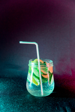 Summer drink coctail strawberry smoothies in glass jar, berries and mint. Healthy food, diet and weight loss conceptの写真素材