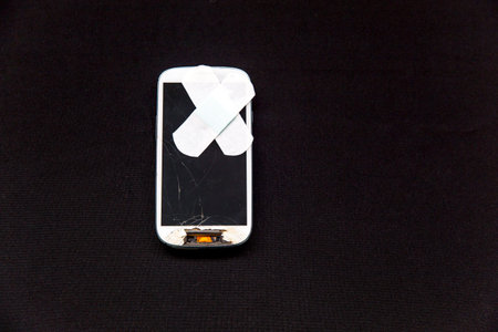 smartphone parts and repairing tools, flat lay, top view