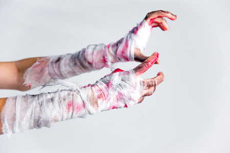 Halloween theme: an image of zombie hands with black nailsの写真素材