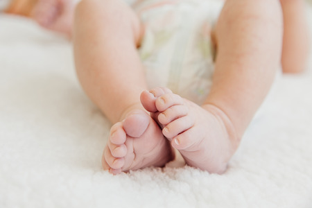 cute newborn baby on the first months of lifeの写真素材
