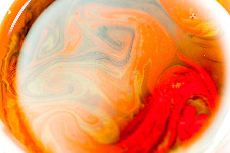 a drop of paint pouring in water