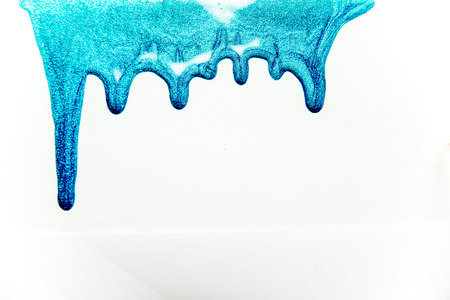 strokes and blots of paint on white backgroundの写真素材