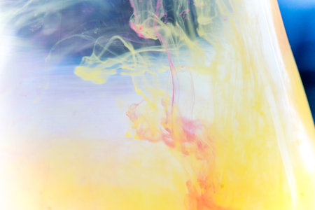 a drop of paint pouring in water