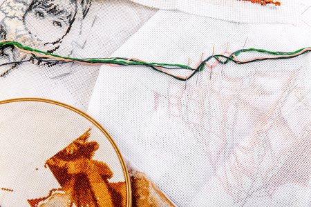 Creative sewing supplies and accessories on a tableの写真素材