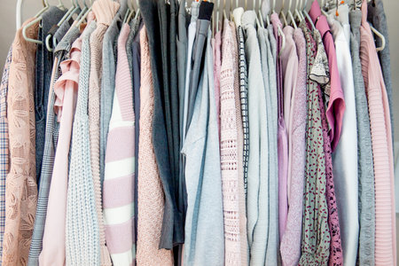 Fashion winter coats hanged on a clothes rack