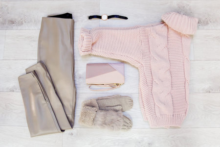Fashion winter coats hanged on a clothes rack