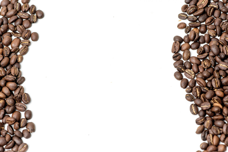 brown coffee beans on a white backgroundの写真素材
