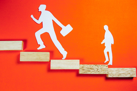 success concept - white man figure on a ladderの写真素材