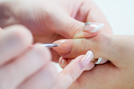 nail care and manicure in a nail salonの写真素材