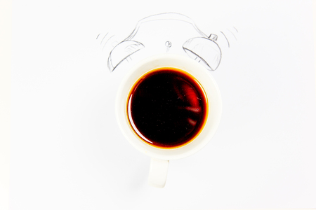 coffee is a fuel concept - a cup on a white backgroundの写真素材