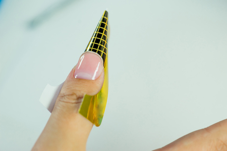nail care and manicure in a nail salonの写真素材
