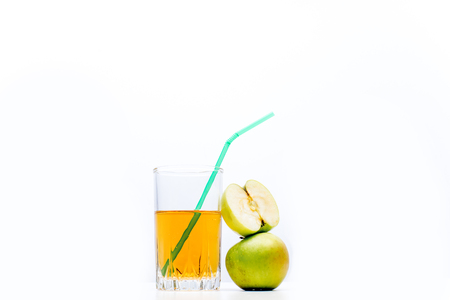 different fruit and juice or smoothie in a glassの写真素材