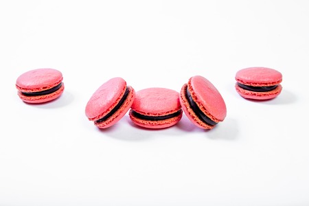 various colorful sweet macarons cookies for dessertの写真素材