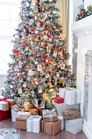 Christmas living room with a christmas tree and presents under it