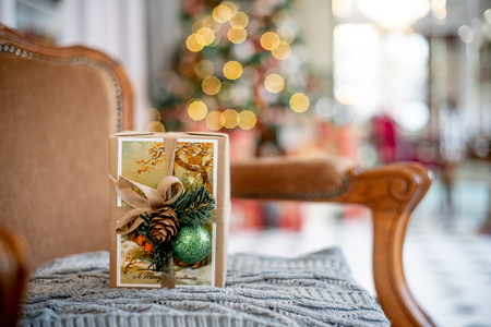 Christmas living room with a christmas tree and presents under itの写真素材