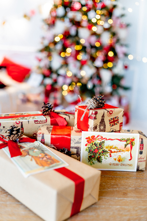 Christmas living room with a christmas tree and presents under itの写真素材