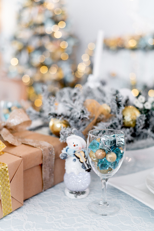 Christmas living room with a christmas tree and presents under itの写真素材