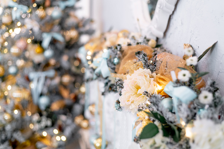 Christmas living room with a christmas tree and presents under itの写真素材