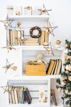 Christmas living room with a christmas tree and presents under itの写真素材