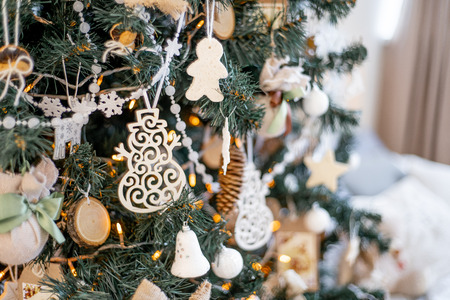Christmas living room with a christmas tree and presents under itの写真素材