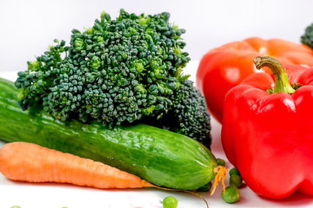 a fresh group of vegetables on white backgroundの写真素材