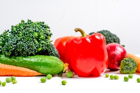 a fresh group of vegetables on white backgroundの写真素材