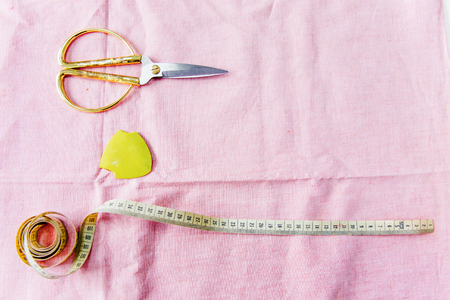 Creative sewing supplies and accessories on a tableの写真素材