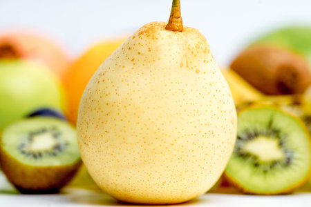 Creative layout made of fruits on a white backgroundの写真素材