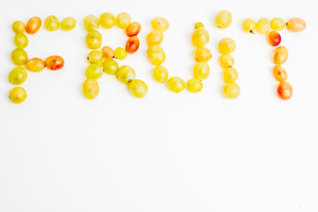 Creative layout made of fruits on a white backgroundの写真素材