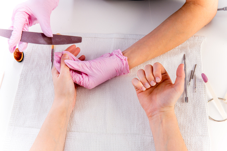 professional manicure procedure in a beauty salonの写真素材