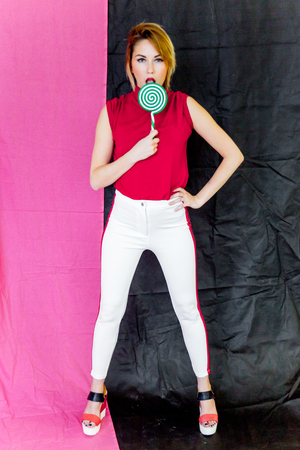 Fashion photo of a beautiful young womanの写真素材