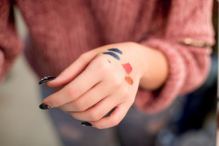 Professional makeup artist working on young girlの写真素材