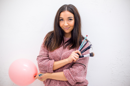 professional makeup artist with her eyebrushes and other instrumentsの写真素材