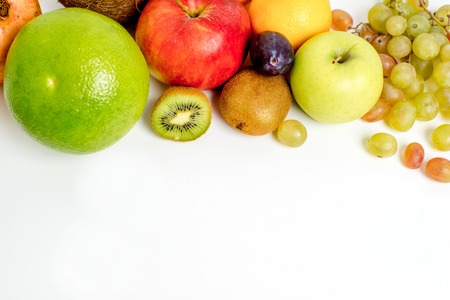 Creative layout made of fruits on a white backgroundの写真素材